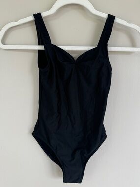 “Dancer’s bundle” 2 black leotards size 7/8 girls and one pink hair bow